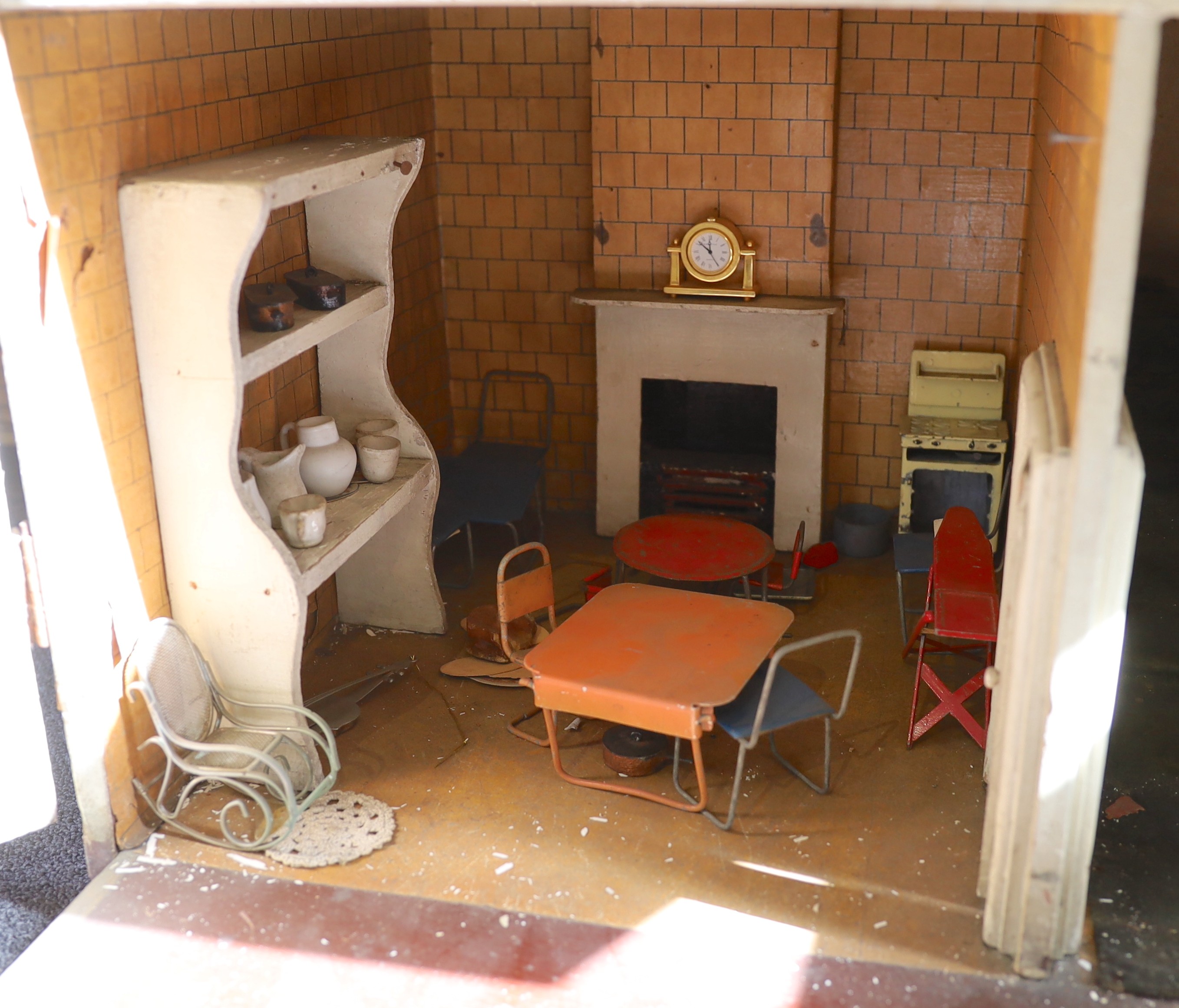 ‘Kits Coty House': An important G. & J. Lines furnished dolls’ house, dated 1912